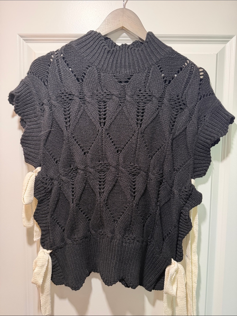 Black Openwork Knit Sleeveless Pullover with Cream Side Ties